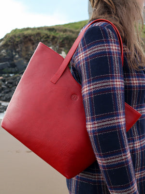 Shot in context photo of our Caitlin classic large tote bag in red leather, made in Ireland