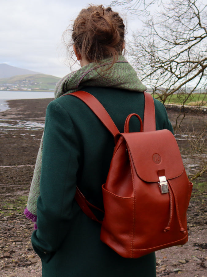 Leather drawstring duffle backpack, handmade in Ireland. Available in Chestnut, Black, Dark brown, Burgundy, Navy and Red